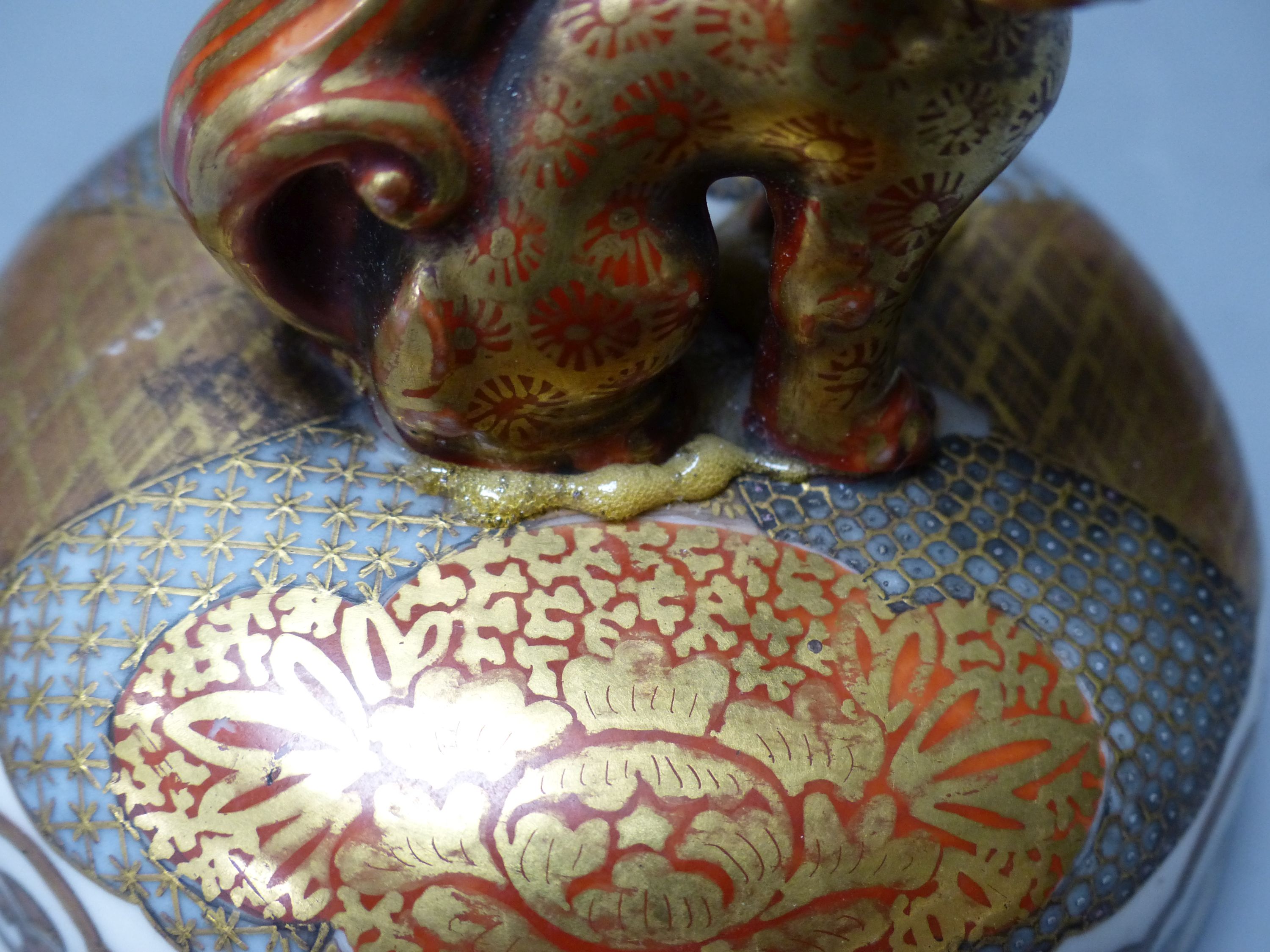 A Japanese Kutani porcelain garniture of two vases and a similar koro and cover, tallest 31cm